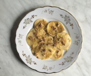 Corzetti pasta with walnut sauce, a simple pesto made with walnuts and extra virgin olive oil
