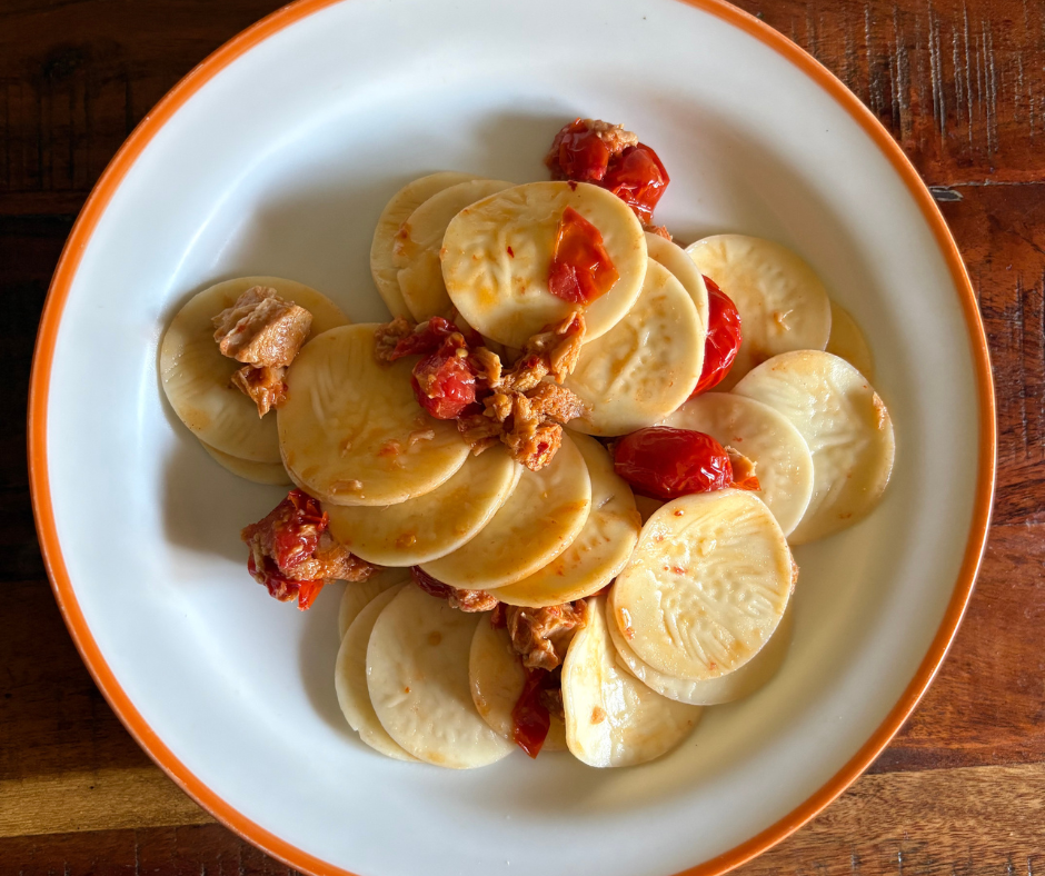 Corzetti pasta with cherry tomatoes and canned tuna